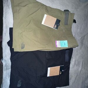2 pairs of north face shorts. Size 20w but fit more like an xl